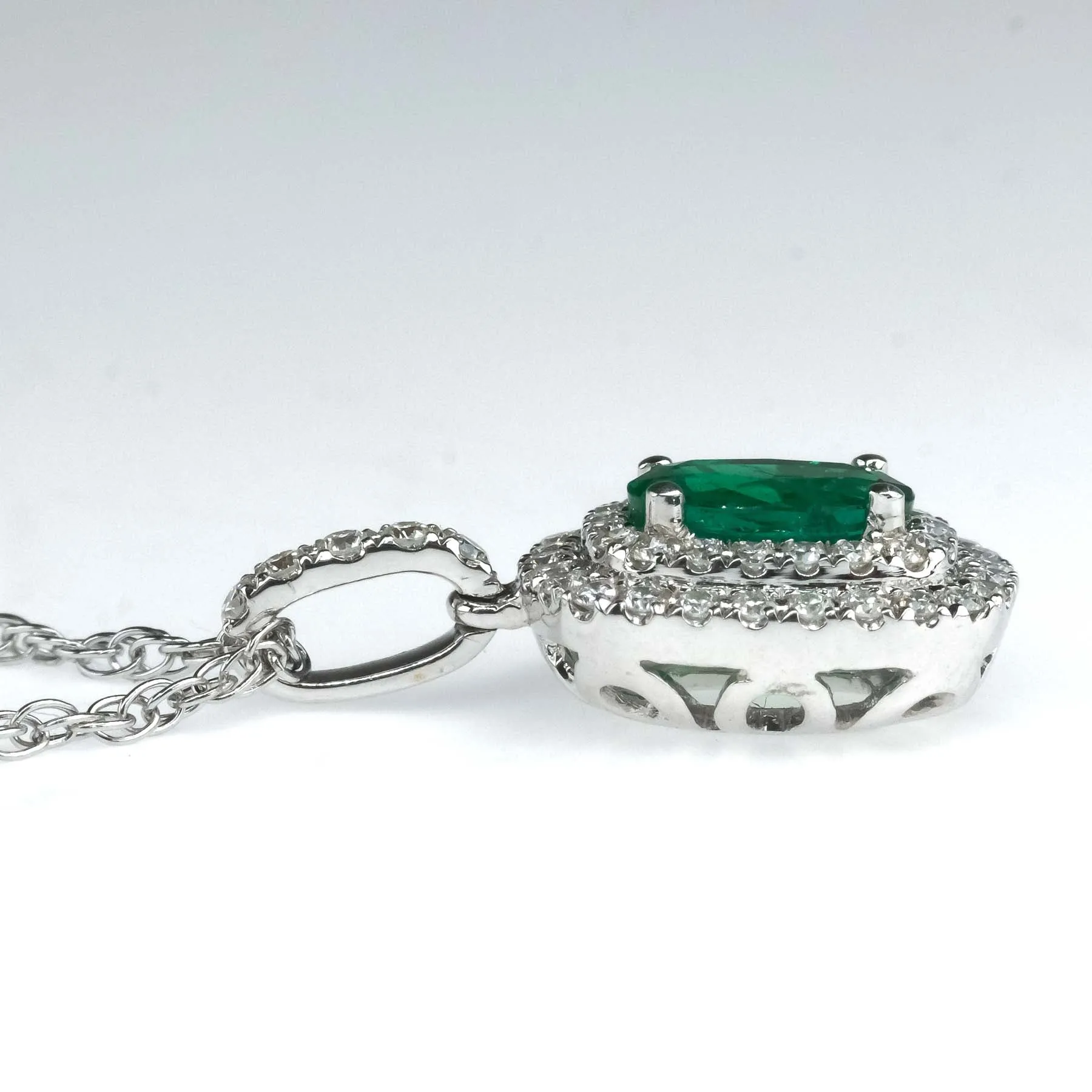 0.76ct Emerald & Diamond Accents Halo Pendant on 18" Chain in 14K/18K White Gold