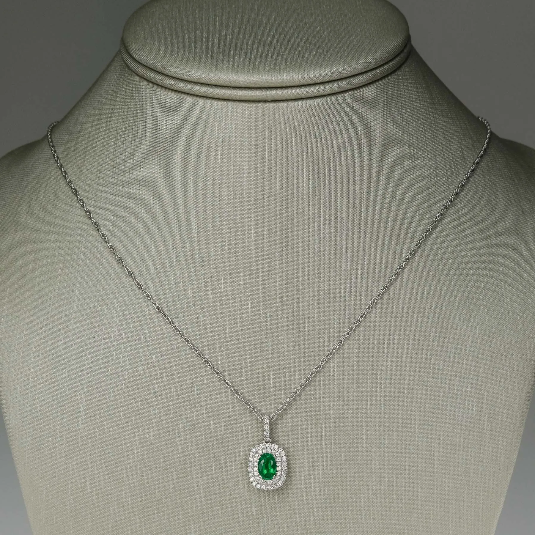 0.76ct Emerald & Diamond Accents Halo Pendant on 18" Chain in 14K/18K White Gold