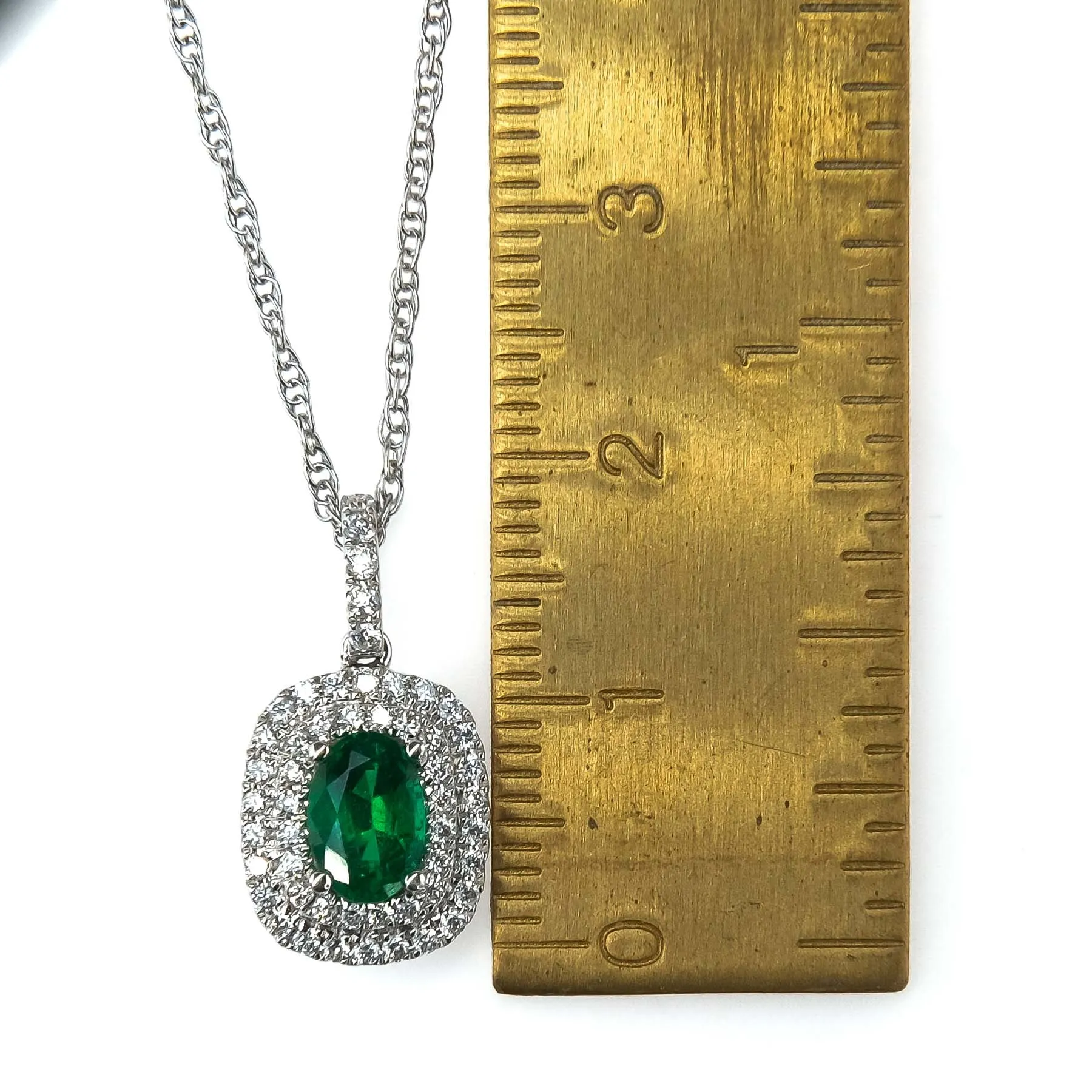 0.76ct Emerald & Diamond Accents Halo Pendant on 18" Chain in 14K/18K White Gold