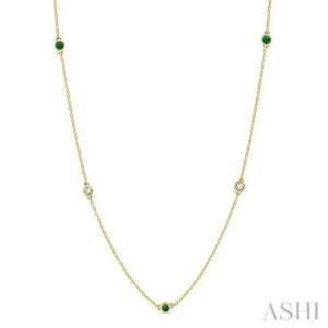 3/8 ctw Round Cut Diamond and 2.6MM Emerald Precious Station Necklace in 14K Yellow Gold