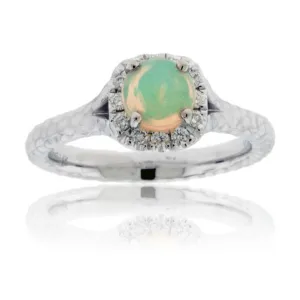 Ethiopian Opal and Diamond Halo Ring